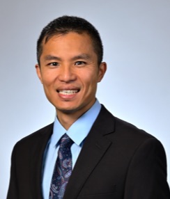 Headshot of Dr. Alexander Huang.